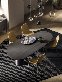 Tavolo Stone Devina Nais — piano sagomato, vista in ambiente